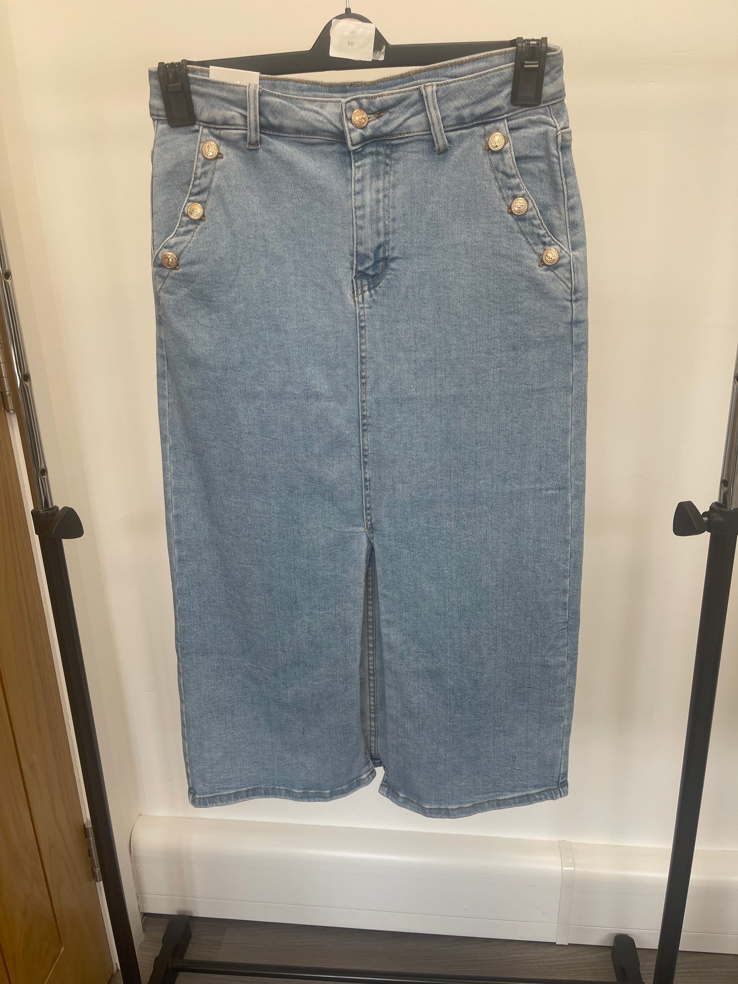 Denim skirt with gold buttons