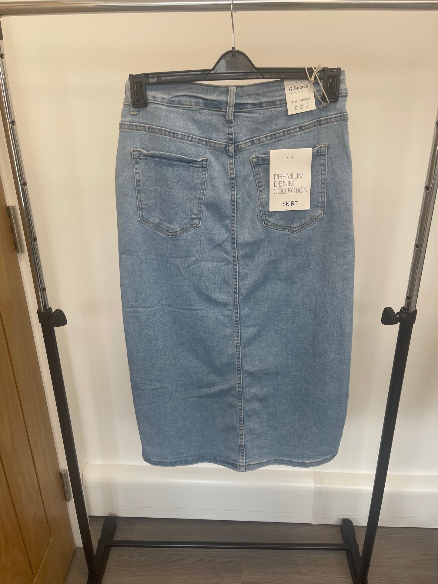 Denim skirt with gold buttons