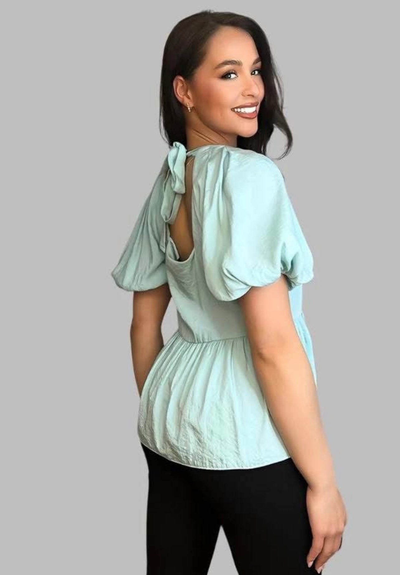Aqua peplum tie back blouse